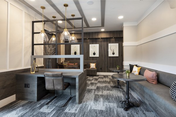 Clubhouse with modern seating and communal spaces at Alta River Oaks Apartments