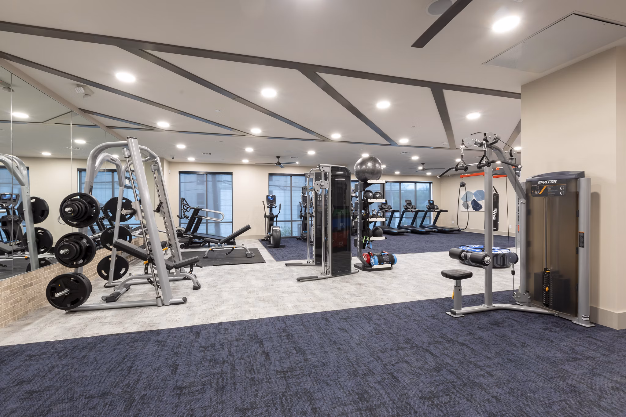 Fitness center with modern equipment at Alta River Oaks Apartments, offering residents a state-of-the-art workout facility