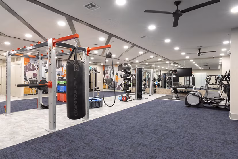 Modern fitness center with state-of-the-art equipment at Alta River Oaks Apartments, enhancing luxury living in the vibrant community