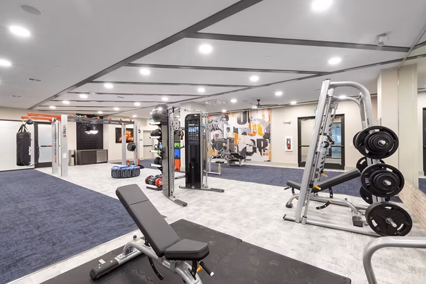 State-of-the-art fitness center featuring modern equipment at Alta River Oaks Apartments