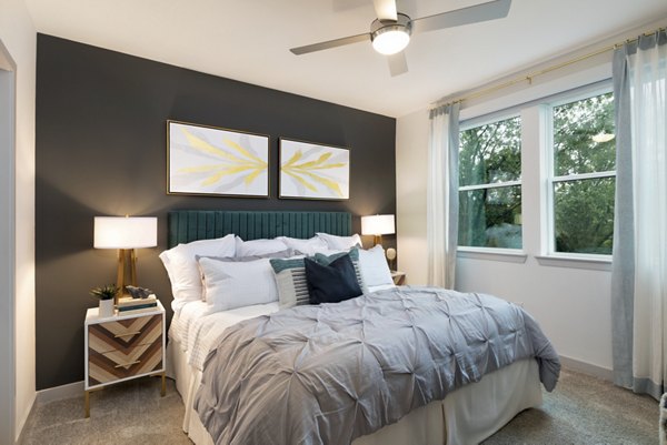 Spacious living room with modern decor in Alta River Oaks Apartments