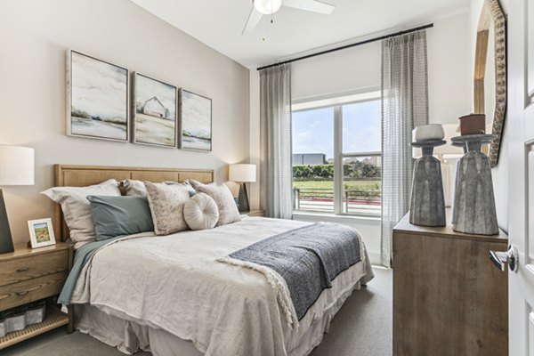 bedroom at Alta Riverside Apartments 