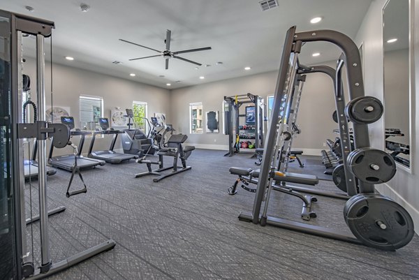 State-of-the-art fitness center with cardio equipment at Alta Rolling Oaks apartments