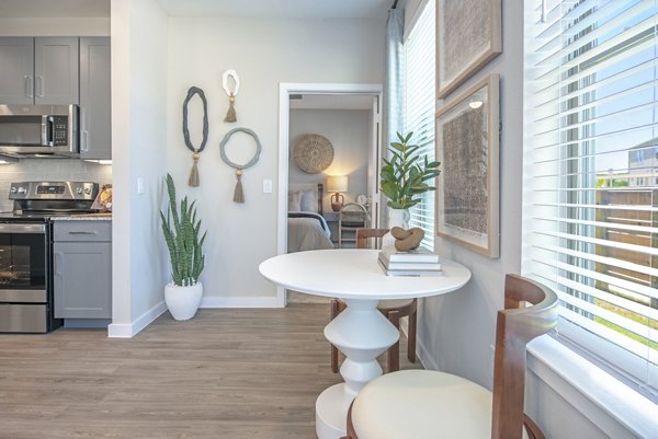 Contemporary kitchen with stainless steel appliances at Alta Farms at Cane Ridge luxury apartments