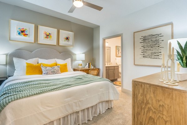 Elegant bedroom with modern decor at Alta Sergeant Apartments, featuring luxury finishes and spacious layout Ideal for comfort and relaxation