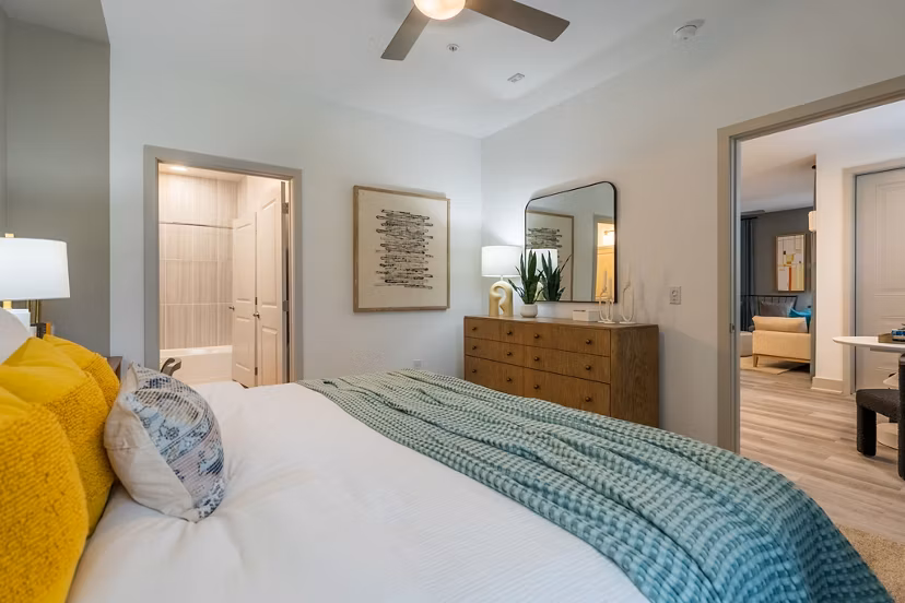 Cozy bedroom with modern furnishings in Alta Sergeant Apartments