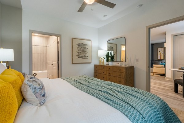 Cozy bedroom with modern furnishings in Alta Sergeant Apartments
