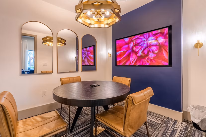 Modern clubhouse featuring elegant design at Alta Sergeant Apartments, offering luxury amenities for residents