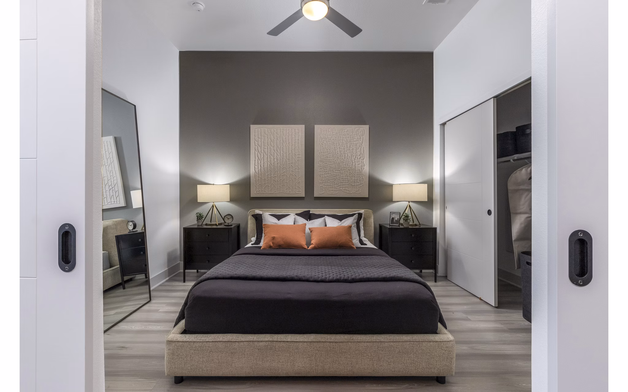 Cozy bedroom with modern furnishings at Alta Sloan's Lake luxury apartments