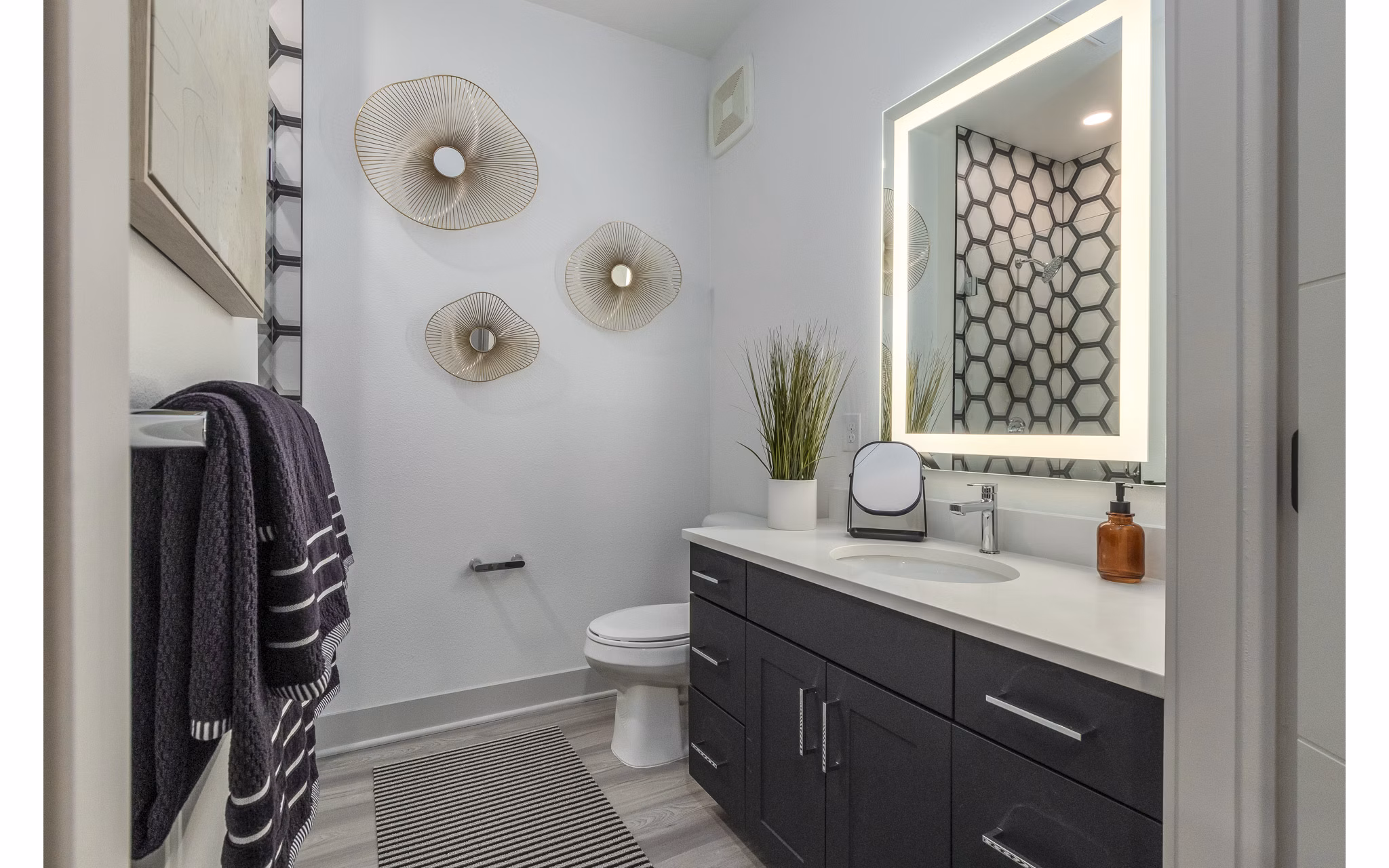 Modern bathroom featuring sleek fixtures at Alta Sloan's Lake luxury apartments