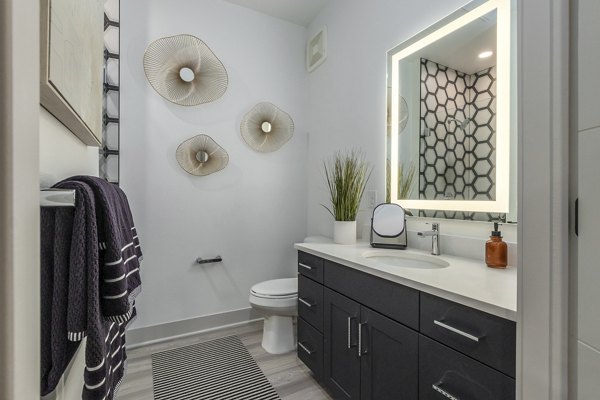 Modern bathroom featuring sleek fixtures at Alta Sloan's Lake luxury apartments