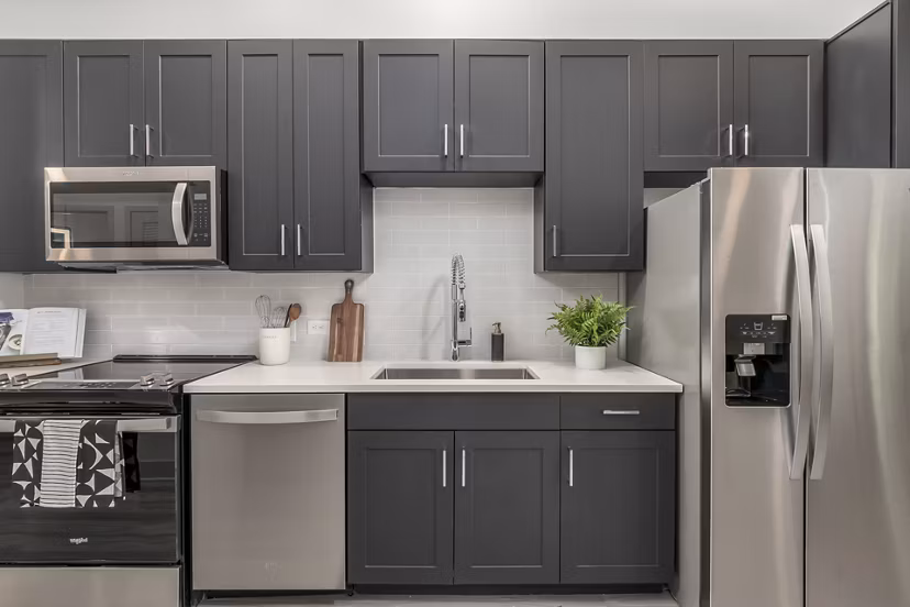Modern kitchen with stainless steel appliances at Alta Sloan's Lake luxury apartments