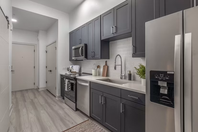Modern kitchen with stainless steel appliances at Alta Sloan's Lake luxury apartments