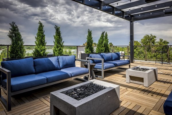 Patios featuring comfortable seating and lush greenery at Alta Sloan's Lake luxury apartments
