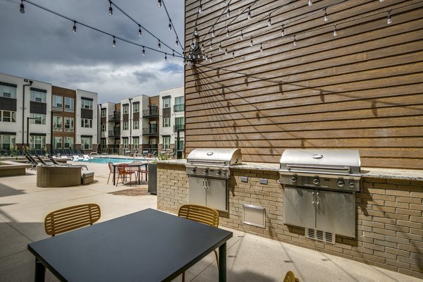 Resort-style pool with lounge chairs at Alta Sloan's Lake luxury apartments
