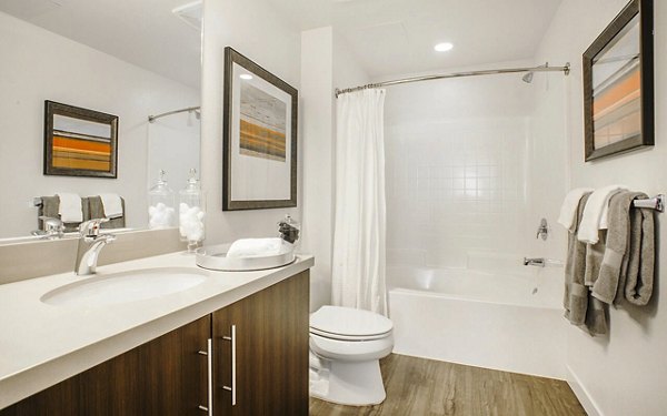 Bathroom featuring sleek fixtures and modern design at Alta South Bay Apartments