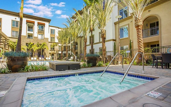 Relaxing hot tub and sauna at Alta South Bay Apartments offering luxury and comfort for residents