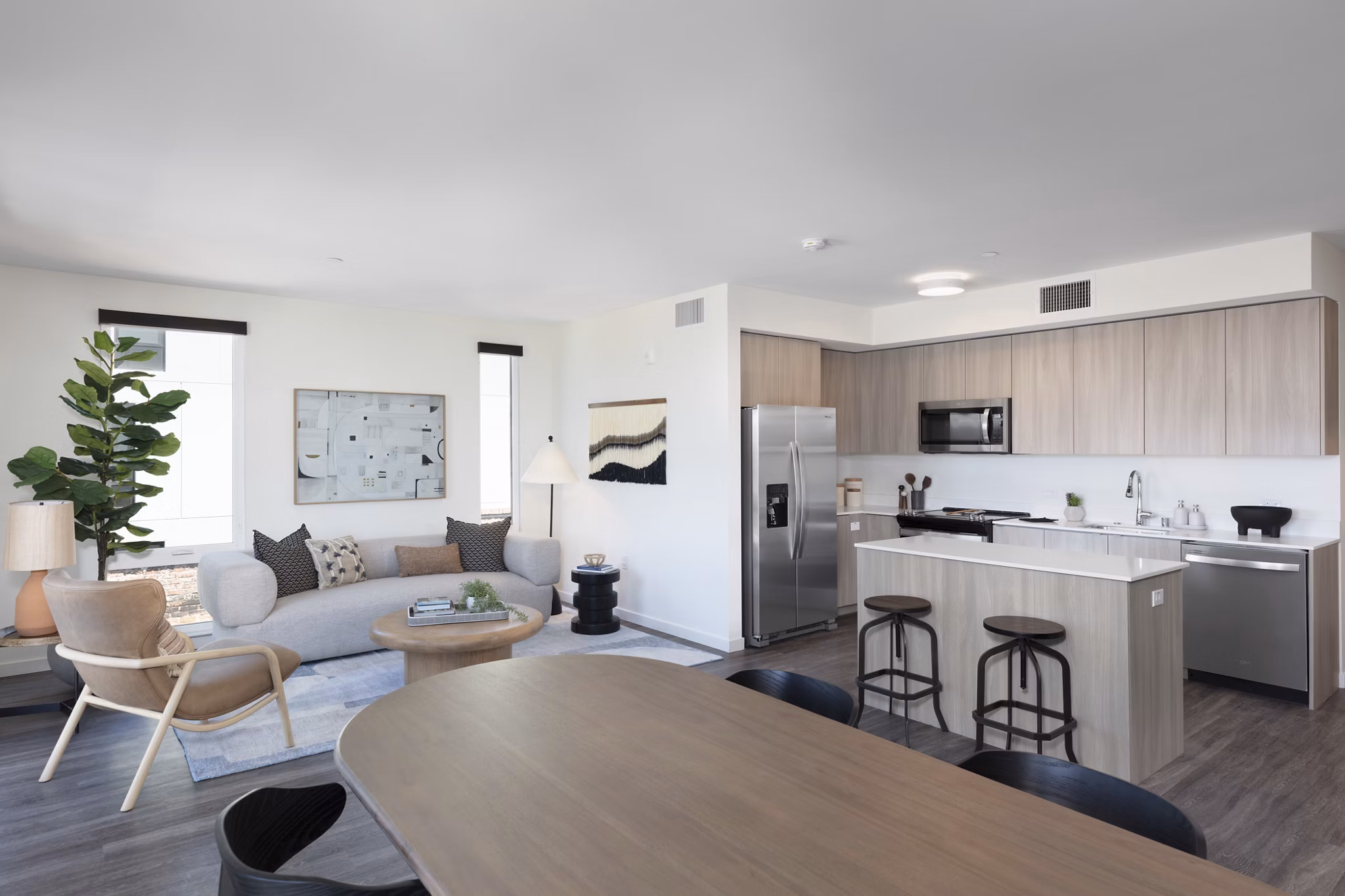 Spacious living room with modern furnishings at Alta Star Harbor Apartments, luxury residence designed by Greystar