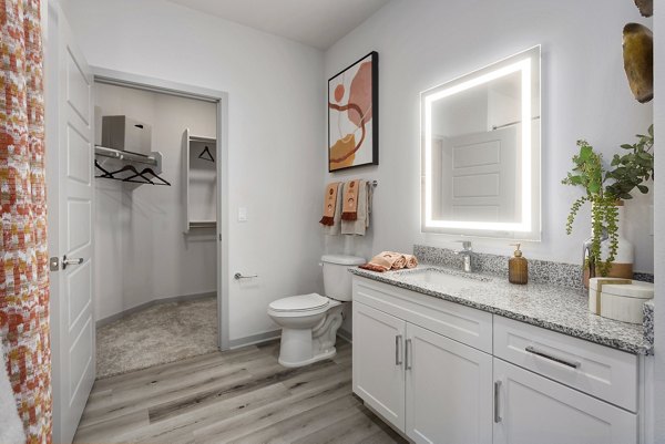 Bathroom with modern fixtures and sleek design in Alta Surprise Apartments, a luxury property managed by Greystar in Surprise, Arizona
