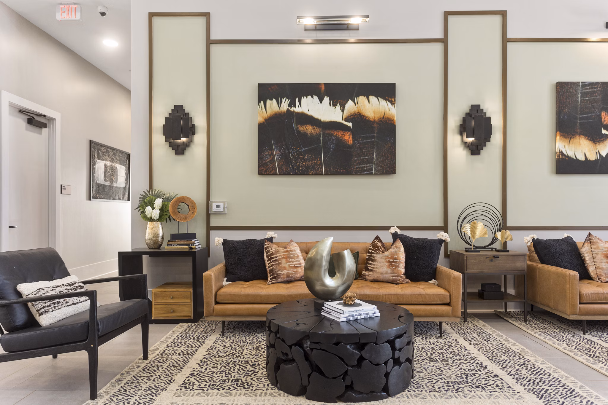 Elegant clubhouse featuring modern design at Alta Surprise Apartments, perfect for social gatherings and relaxation in a luxury setting