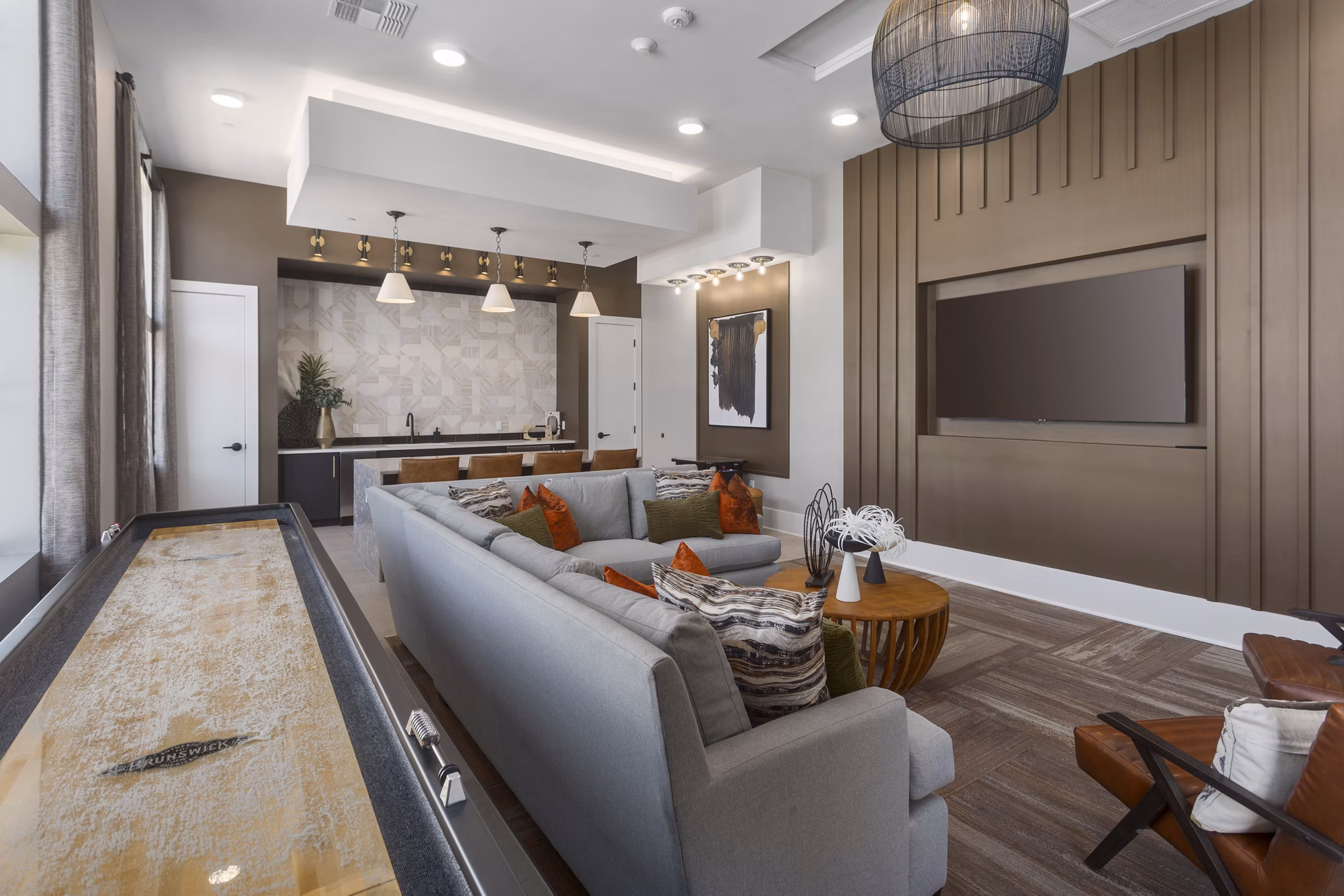 Clubhouse featuring modern design and spacious seating at Alta Surprise Apartments, luxury living within Greystar communities