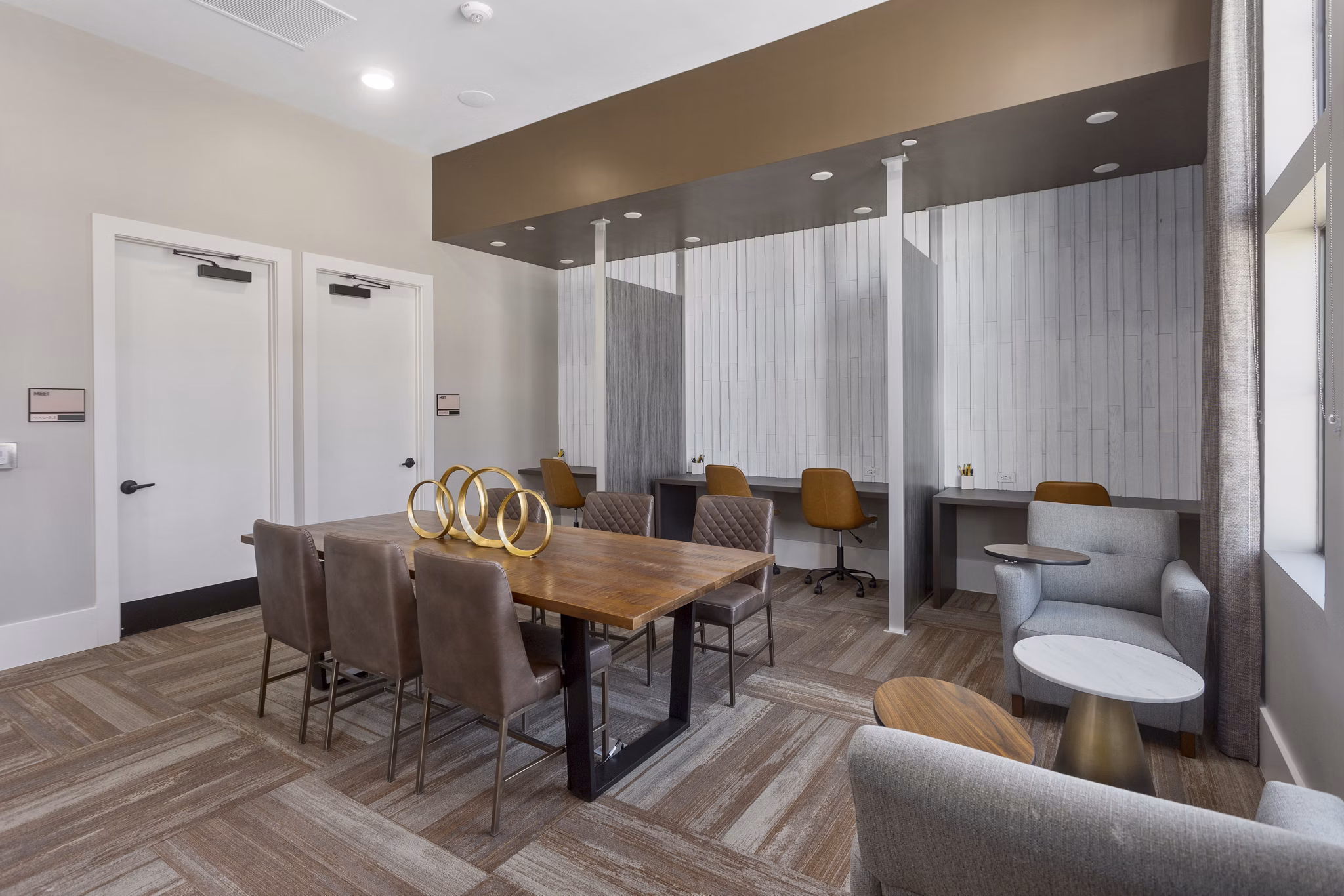 Clubhouse with stylish interiors at Alta Surprise Apartments, a luxury community with modern design and recreational spaces