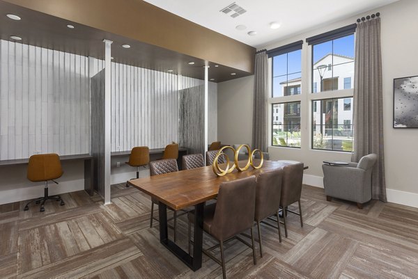 Alta Surprise Apartments: Modern clubhouse featuring contemporary design and seating areas