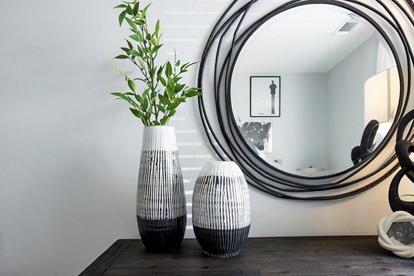 Cozy bedroom with neutral palette and large window at Alta Town Center Apartments