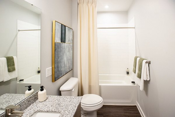 Modern bathroom with sleek fixtures at Alta Town Center Apartments, highlighting luxury living in a contemporary space for comfort and style