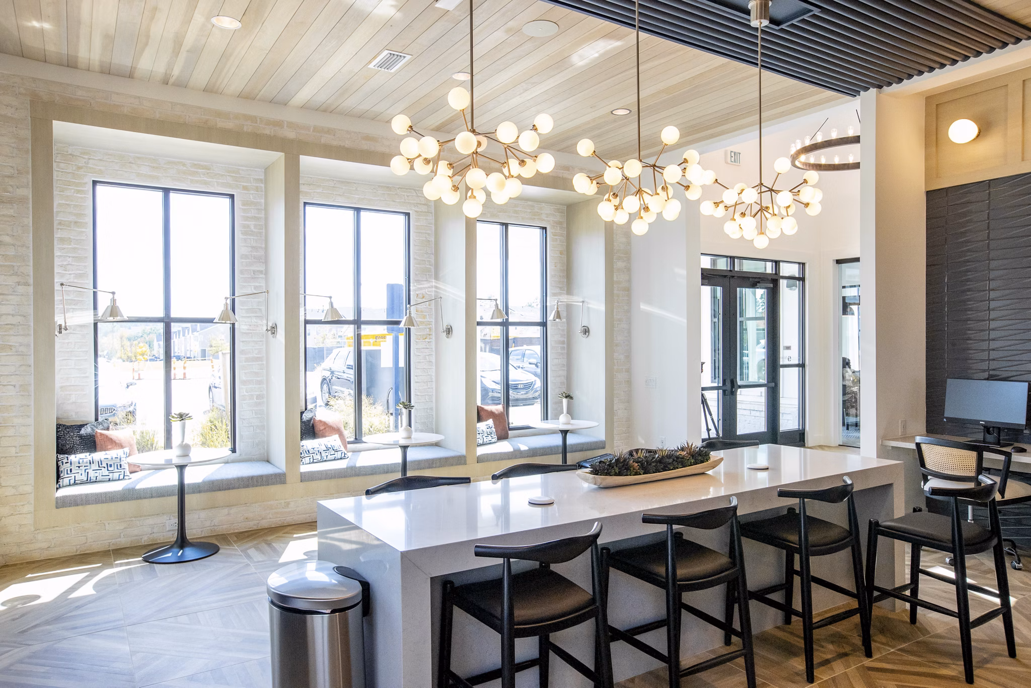 Clubhouse featuring modern design elements and comfortable seating in Alta Town Center Apartments Perfect space for community gatherings and events