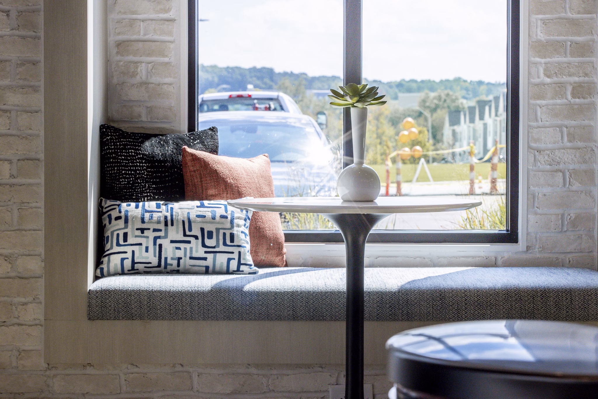 Clubhouse with cozy seating and modern decor in Alta Town Center Apartments
