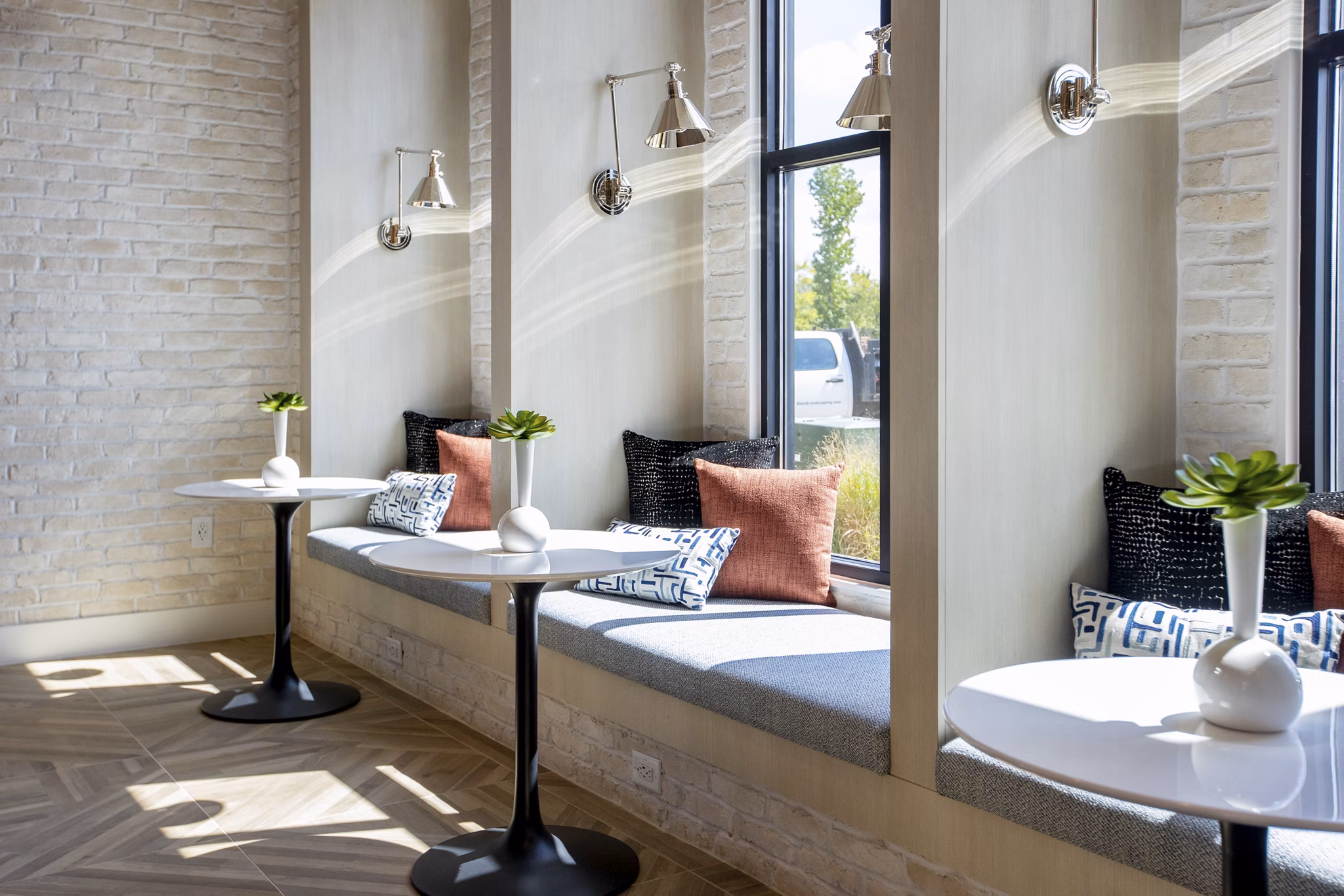 Clubhouse with modern seating and decor at Alta Town Center Apartments