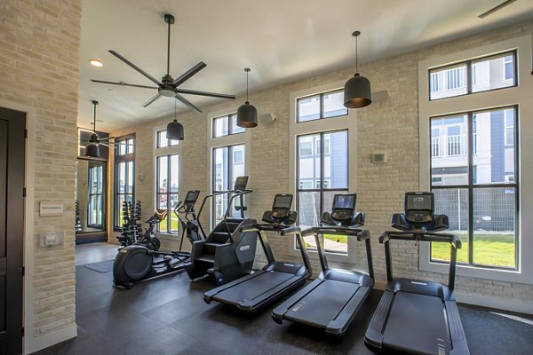 State-of-the-art fitness center with advanced equipment at Alta Town Center Apartments