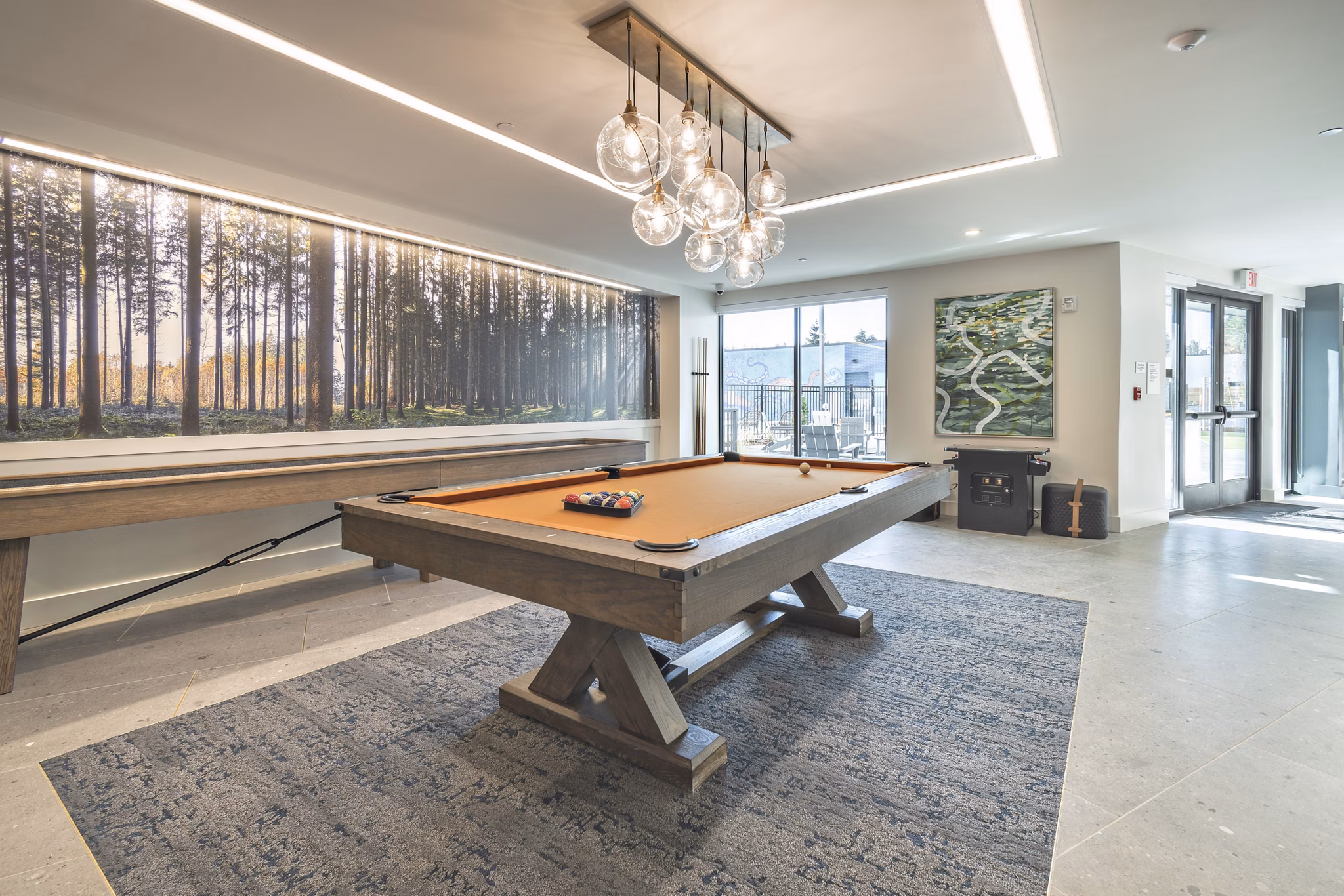 Clubroom featuring modern furnishings and communal seating at Alta University Place Apartments