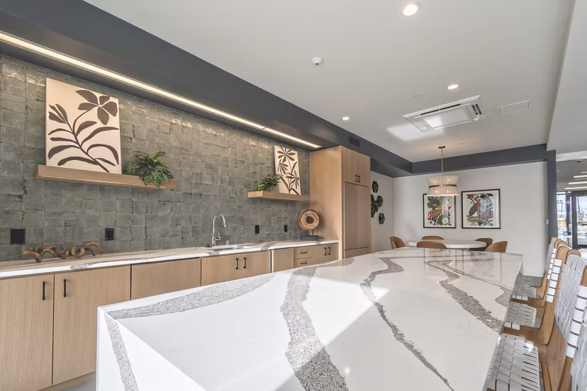 Elegant clubroom with modern furnishings at Alta University Place Apartments