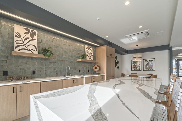 Elegant clubroom with modern furnishings at Alta University Place Apartments