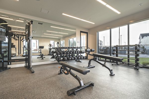 Fitness center with modern equipment at Alta University Place Apartments