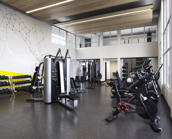 Fitness center with modern equipment at Alta Waverly apartments