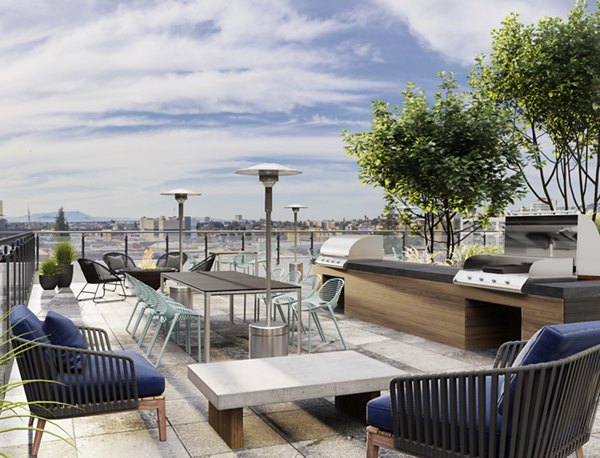 Recreation area with green spaces and walking paths at Alta Waverly Apartments