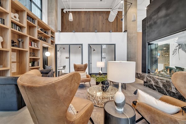 Club house room showcasing elegant contemporary design at Alta West Morehead Apartments