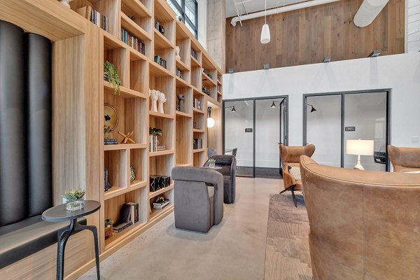 Clubhouse room with modern decor and plush seating at Alta West Morehead luxury apartments