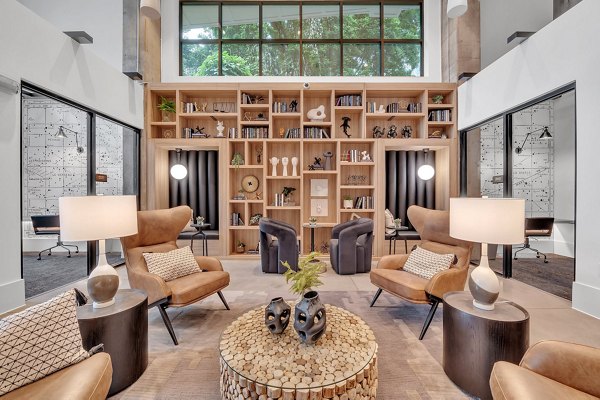 Clubhouse room featuring modern decor and cozy seating at Alta West Morehead luxury apartments