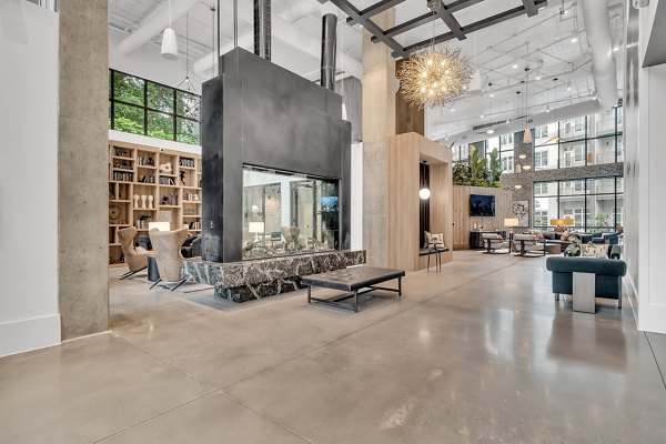 Clubhouse at Alta West Morehead featuring modern seating and entertainment options