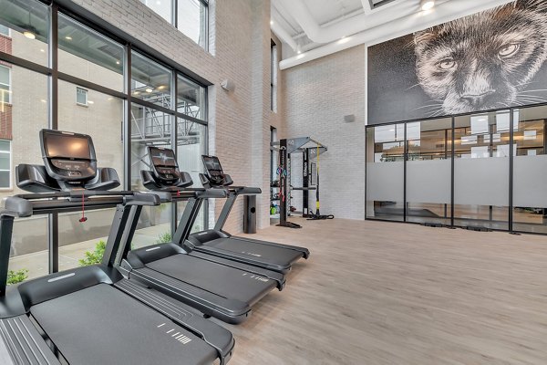 Modern fitness center with state-of-the-art equipment at Alta West Morehead Apartments