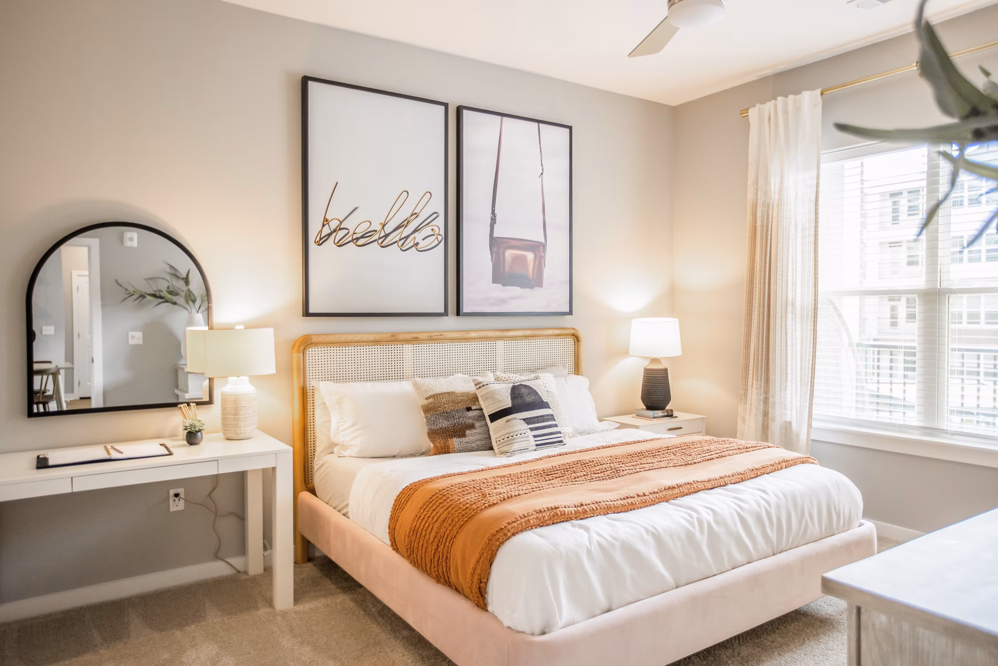 Elegant bedroom with modern furnishings at Alta Wren Apartments