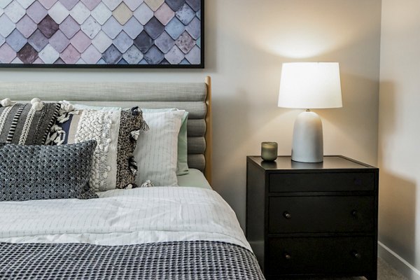 Bedroom featuring contemporary design and modern furnishings in Alta Wren Apartments