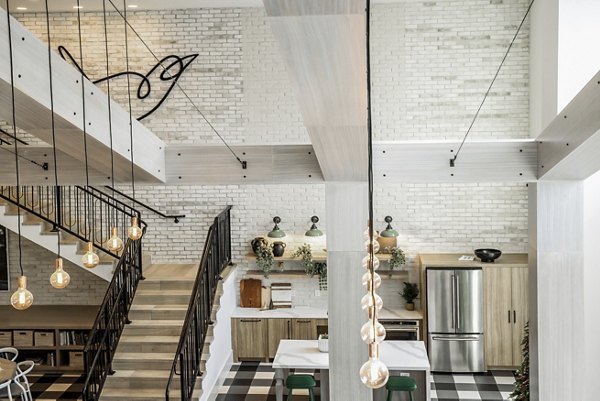 Modern clubhouse with chic lounge seating at Alta Wren Apartments