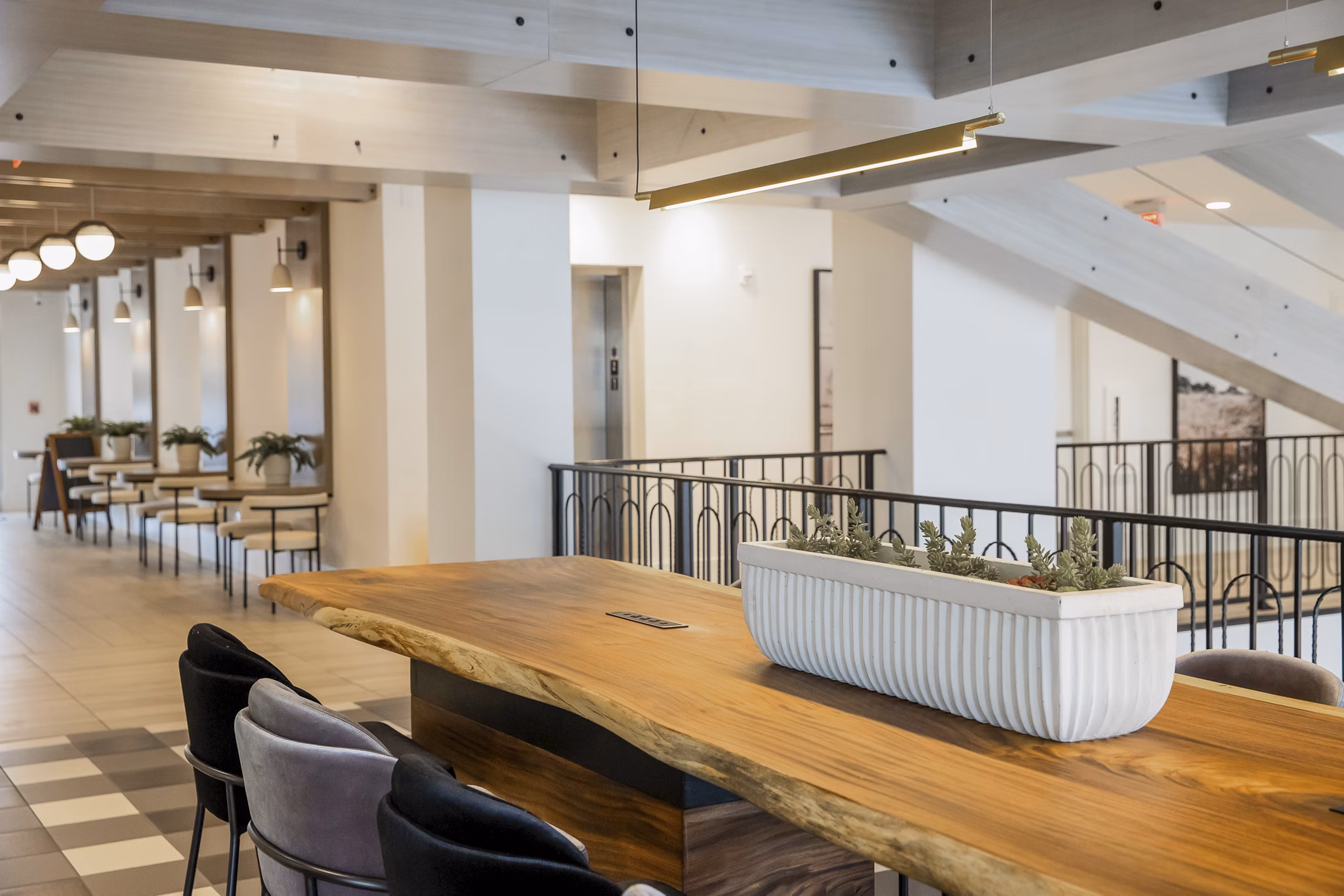 Clubhouse featuring modern furnishings and communal spaces at Alta Wren Apartments