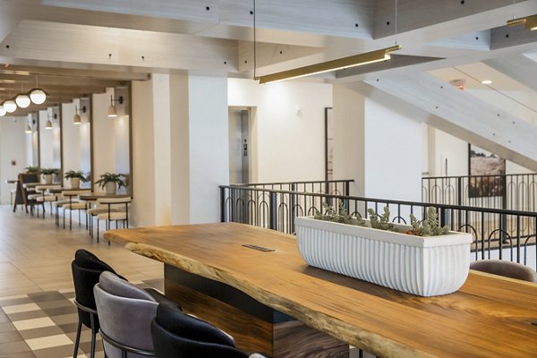 Clubhouse featuring modern furnishings and communal spaces at Alta Wren Apartments