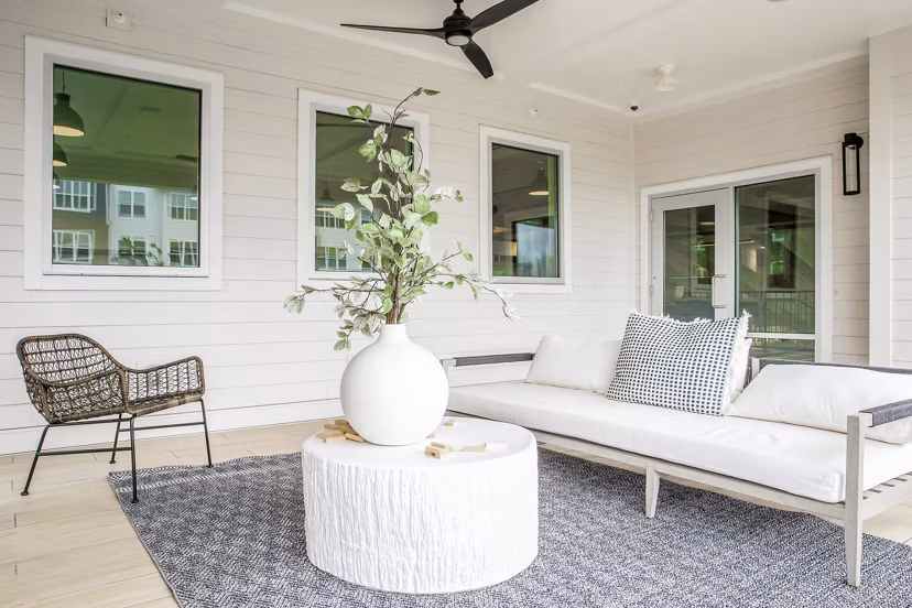 Modern clubhouse with stylish seating and pool table at Alta Wren Apartments, enhancing luxury living experiences